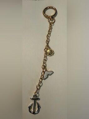 Gold Charm with Sun and Whale Tail Charms